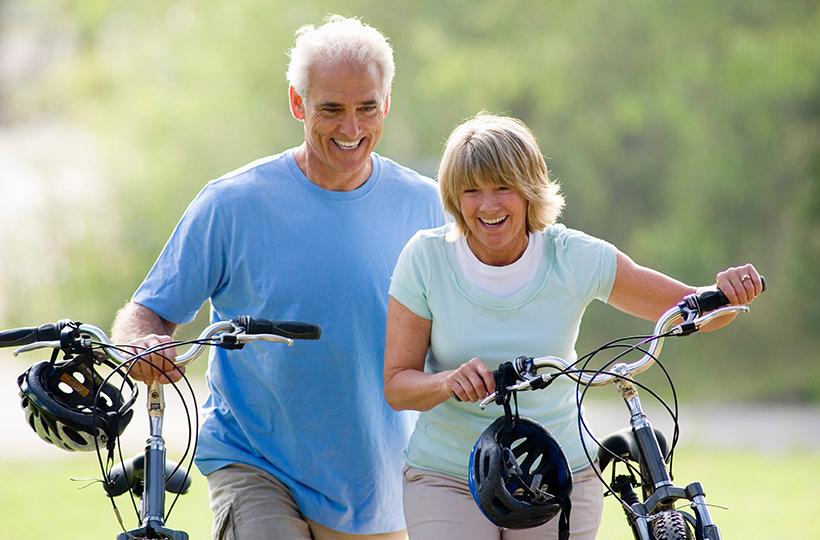 Three,Quarter,Length,Portrait,Of,A,Happy,Mature,Couple,Walking