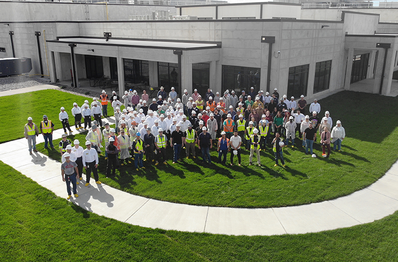 Hilmar employees stand outside the newly opened Dodge City, KS manufacturing site in 2024